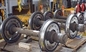 مجموعة عجلات السكة الحديد قياس 600 مم الثقيلة 42CrMo المواد ذات الحواف الفولاذية